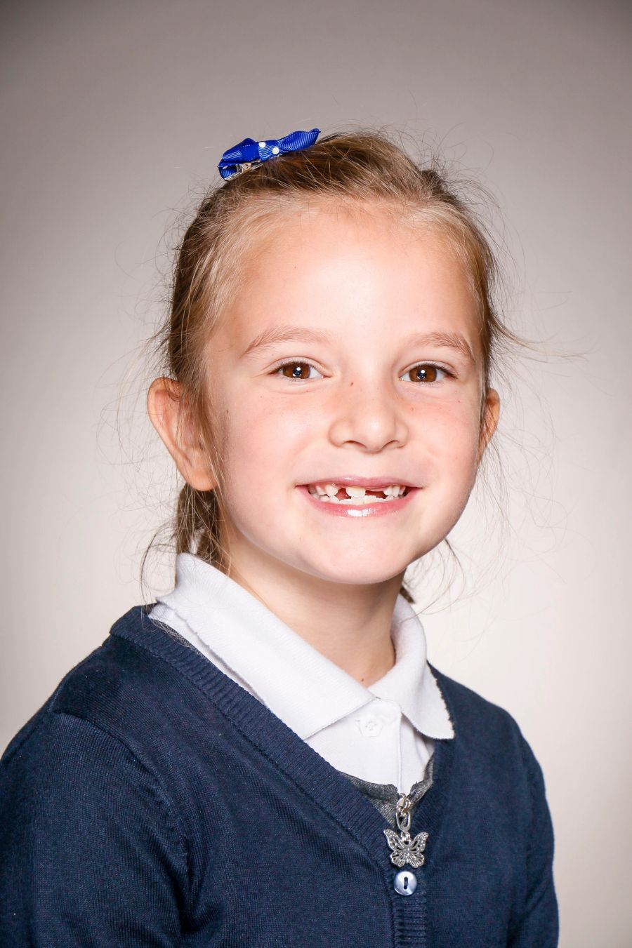 Individual school portrait of a girl smiling